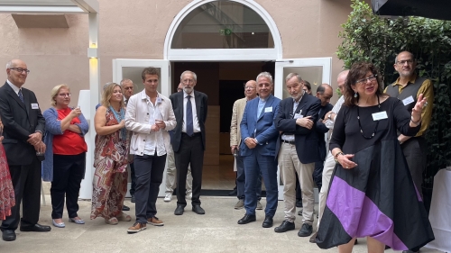 Jewish Studies Professor Susannah Heschel (right) welcomes guests to a reception at Rome's Hotel Indigo.